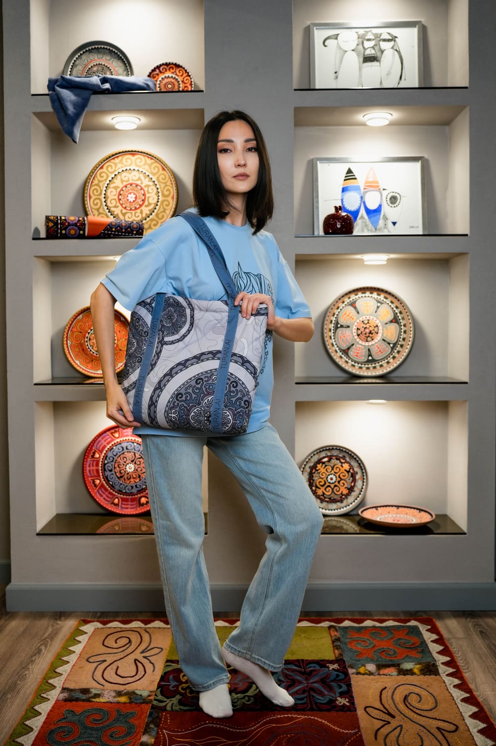 Quilted TURANAI tote bag with ornament in a boutique interior with Kyrgyz ceramics